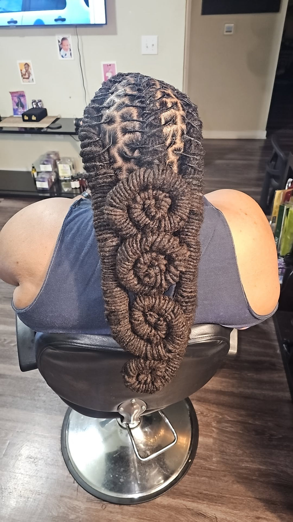 Loc hairstyle by Loc'd By Kandy