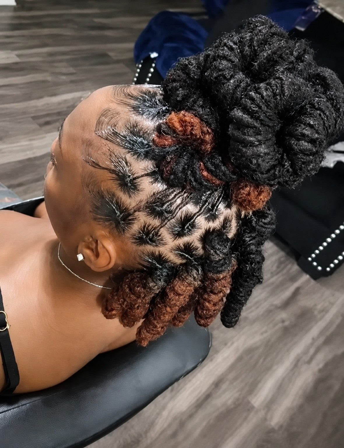Sculpted loc updo by Loc'd By Kandy
