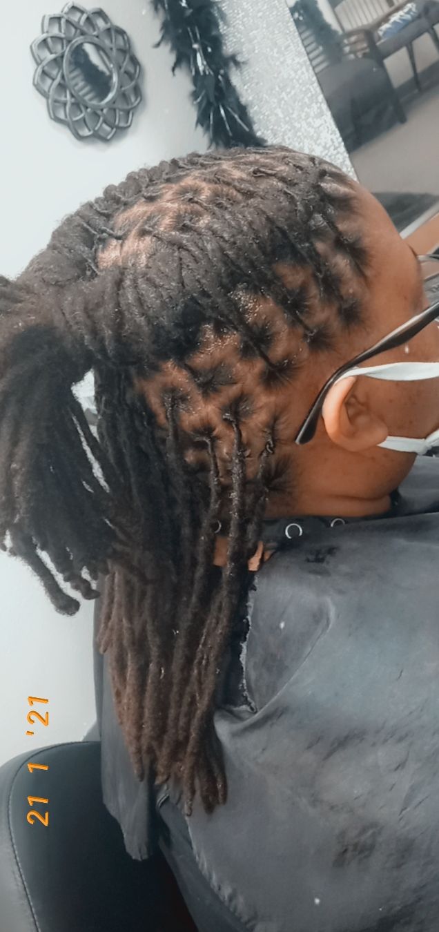 Loc hairstyle by Loc'd By Kandy