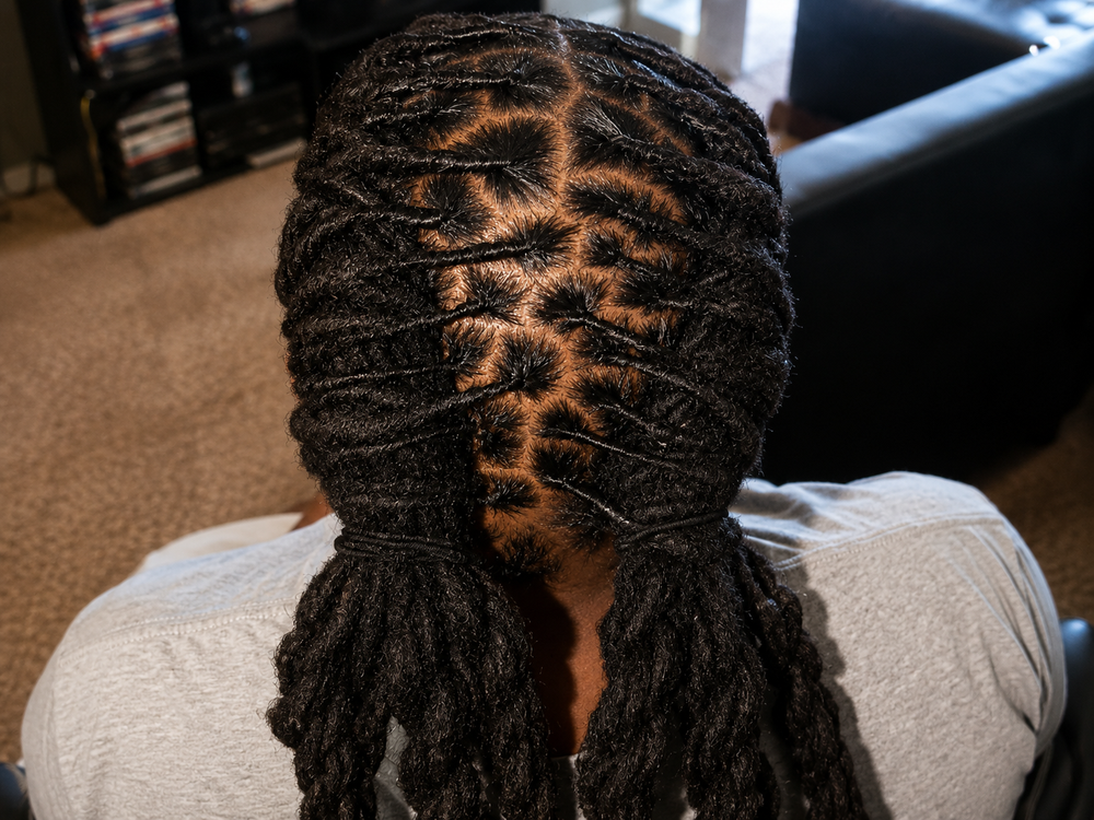 Loc hairstyle by Loc'd By Kandy